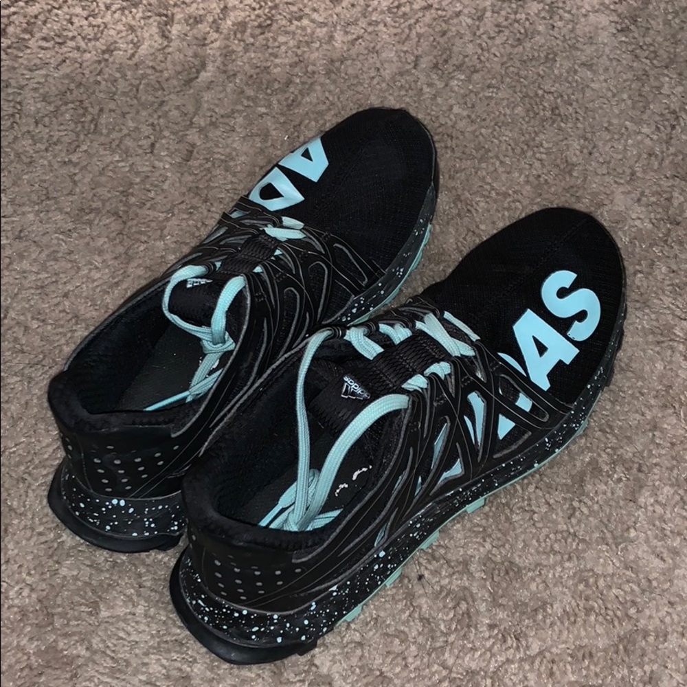 black and teal adidas bounce running shoes.